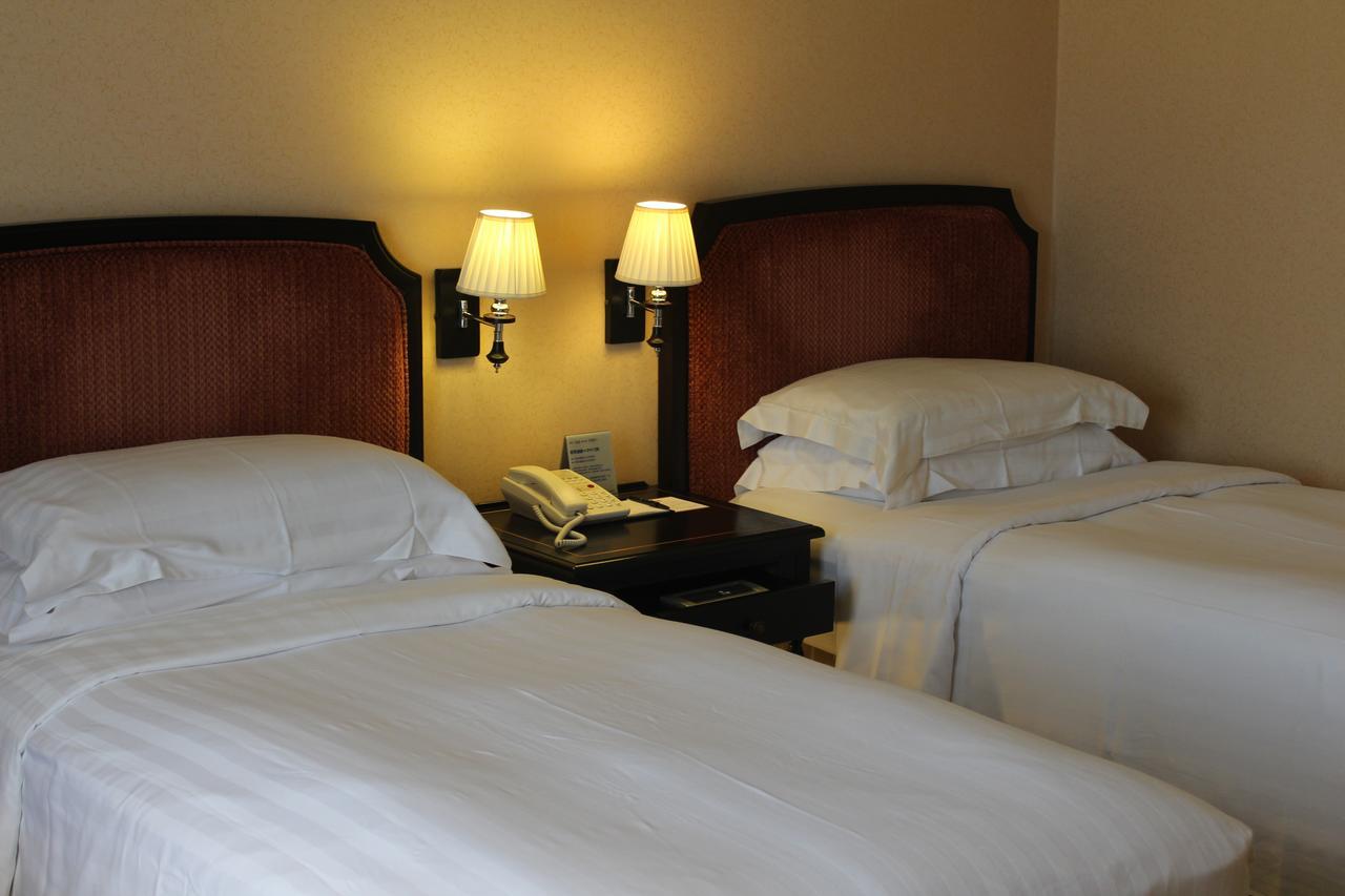 Hotel Kingdom Kaohsiung Chambre photo